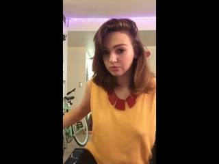 girl in a yellow tunic without a bra